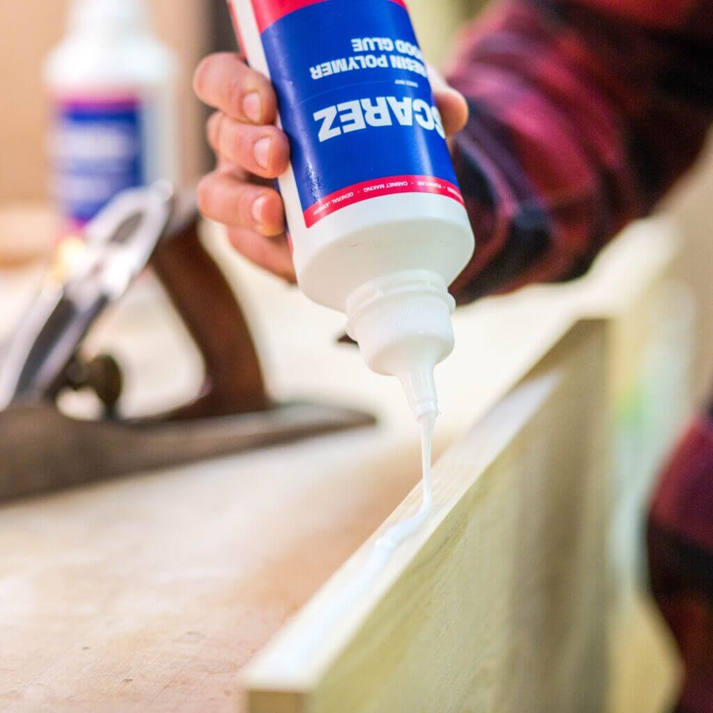 Tannin hybrid resin adhesive system